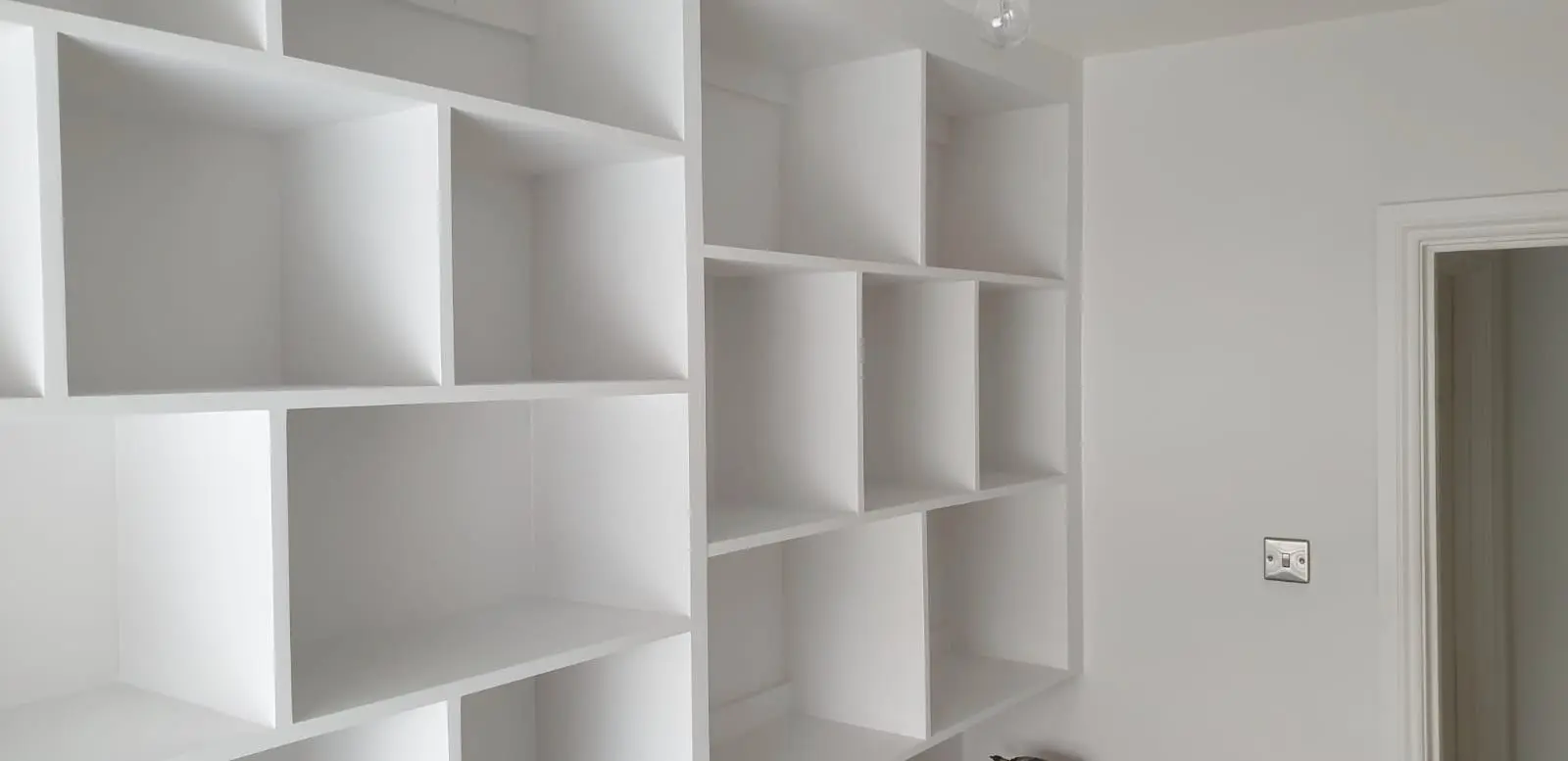 Bespoke built-in white shelving